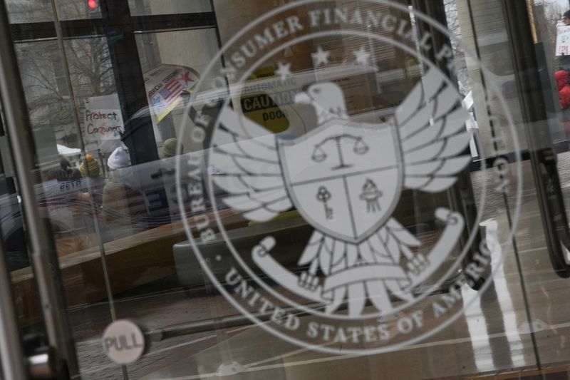 FILE PHOTO: The Consumer Financial Protection Bureau (CFPB) building in Washington, U.S., February 8, 2025. REUTERS/Nathan Howard/File Photo