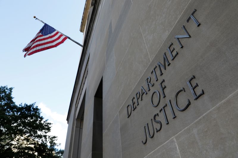 Signage is seen at the United States Department of Justice headquarters in Washington, D.C., U.S., August 29, 2020. REUTERS/Andrew Kelly/File Photo