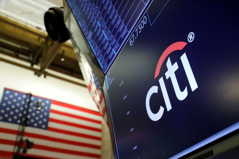 FILE PHOTO: The logo for Citibank is seen on the trading floor at the New York Stock Exchange (NYSE) in Manhattan, New York City, U.S., August 3, 2021. REUTERS/Andrew Kelly/File Photo