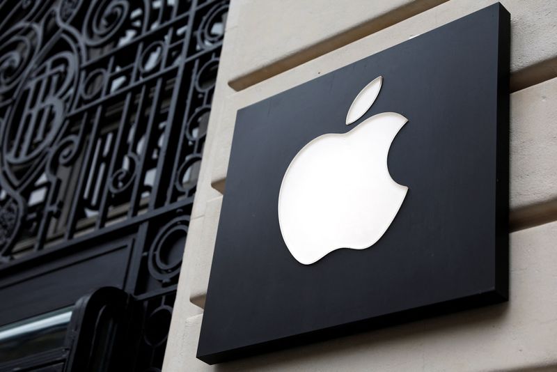 FILE PHOTO: View of an Apple logo at an Apple store in Paris, France, April 23, 2025. REUTERS/Abdul Saboor/File Photo