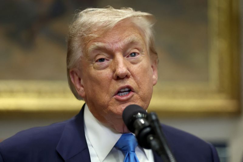 U.S. President Donald Trump speaks after signing the VA Home Loan Program Reform Act at the White House in Washington, D.C., U.S., July 30, 2025. REUTERS/Evelyn Hockstein