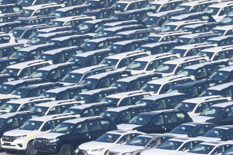 FILE PHOTO: View of a parking lot with new cars for export, at the Belgian port of Zeebrugge, Belgium February 14, 2023. REUTERS/Yves Herman/Pool/File Photo