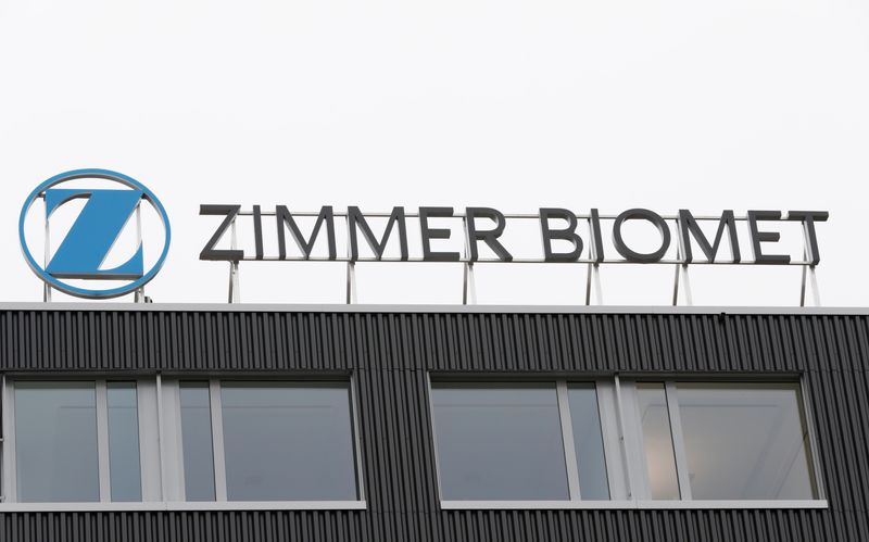 FILE PHOTO: The logo of medical implants maker Zimmer Biomet is seen at a plant in Winterthur, Switzerland, November 16, 2018. Picture taken November 16, 2018. REUTERS/Moritz Hager/ File Photo