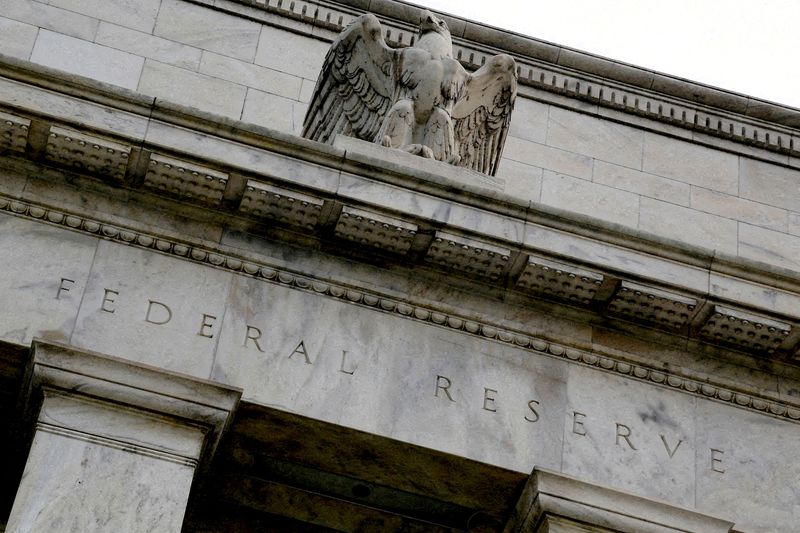 FILE PHOTO: An eagle tops the U.S. Federal Reserve building's facade in Washington, July 31, 2013. REUTERS/Jonathan Ernst/File Photo