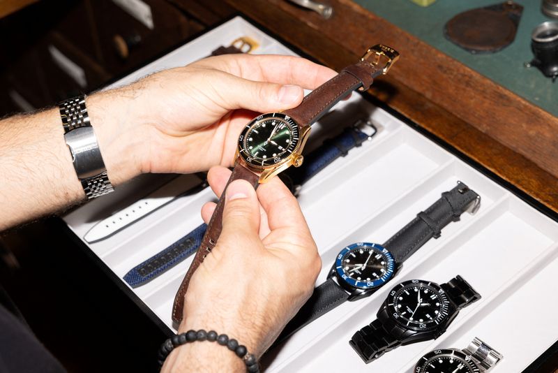 An undated handout image shows a person holding a DuBois et fils watch, at their showroom in Muttenz, Switzerland. DuBois et fils/Handout via REUTERS    THIS IMAGE HAS BEEN SUPPLIED BY A THIRD PARTY. NO RESALES. NO ARCHIVES.