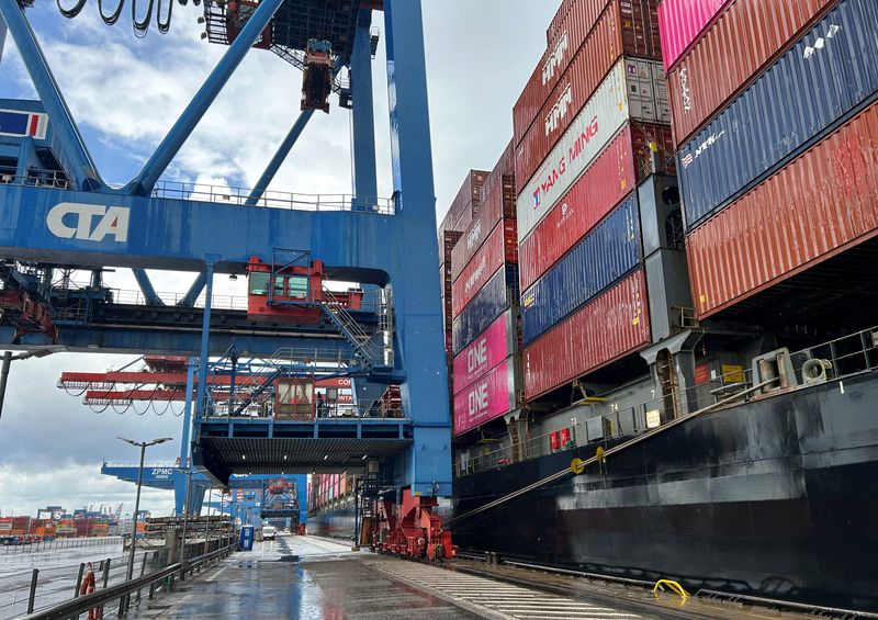 FILE PHOTO: A general view shows the container port of Hamburger Hafen Logistics AG HHLA during a media tour in Hamburg, Germany, July 29, 2025.   REUTERS/Christian Kraemer/File Photo