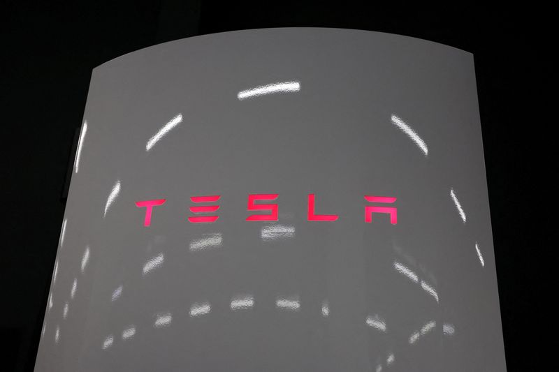 FILE PHOTO: A Tesla supercharger is seen at a charging station in New Delhi, India, August 11, 2025. REUTERS/Bhawika Chhabra/File Photo