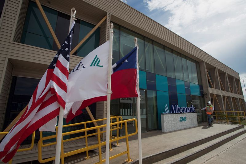 FILE PHOTO: Employees stand by the entrance to the Lithium Conversion plant of U.S. lithium producer Albemarle, in La Negra, Antofagasta, Chile, March 2, 2024. REUTERS/Cristian Rudolffi/File Photo