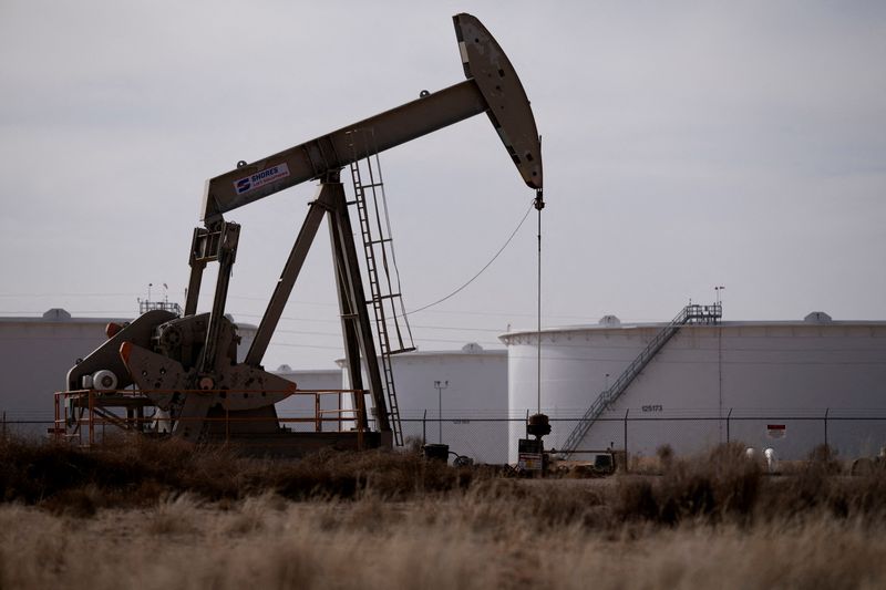 FILE PHOTO: A pump jack operates near a crude oil reserve in the Permian Basin oil field near Midland, Texas, U.S. February 18, 2025.  REUTERS/Eli Hartman/File Photo