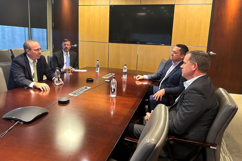 FILE PHOTO: Richmond Fed president Tom Barkin, regional Fed executive Matthew Martin, Coca-Cola Consolidated CFO Matthew Blickley, and outgoing CFO Scott Anthony attend a meeting at Coca-Cola Consolidated company headquarters, in Charlotte, North Carolina, U.S., March 24, 2025. REUTERS/Howard Schneider/File Photo