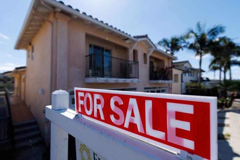 FILE PHOTO: A for sale sign is shown for a residential home in Encinitas, California, U.S. July 25, 2025. REUTERS/Mike Blake/File Photo