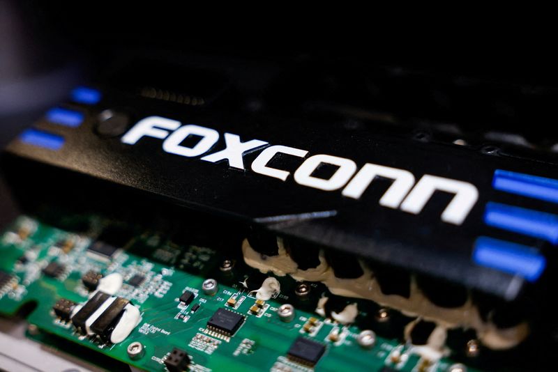 FILE PHOTO: A Foxconn electric two-wheeler powertrain system is displayed at Foxconn?s annual tech day in Taipei, Taiwan October 8, 2024. REUTERS/Ann Wang/File Photo