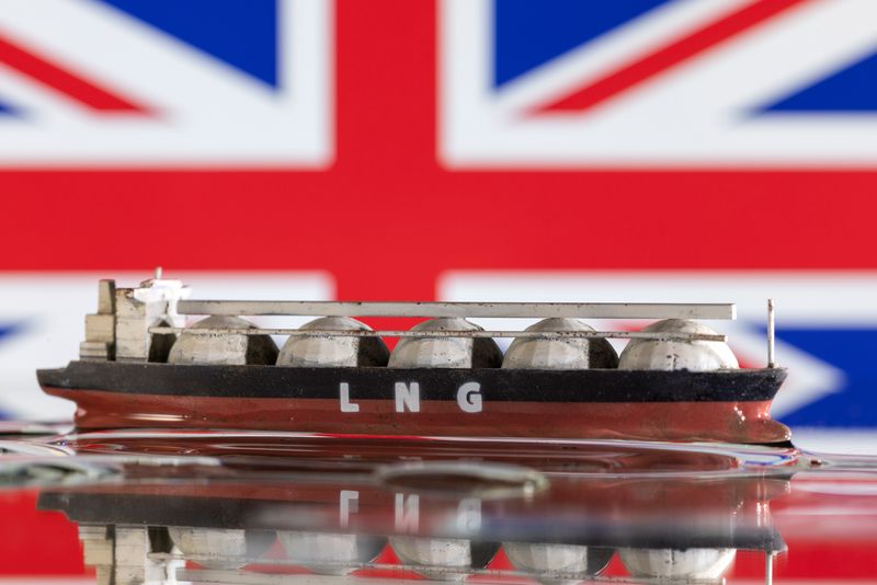 Model of LNG tanker is seen in front of UK's flag in this illustration taken May 19, 2022. REUTERS/Dado Ruvic/Illustration/ File Photo