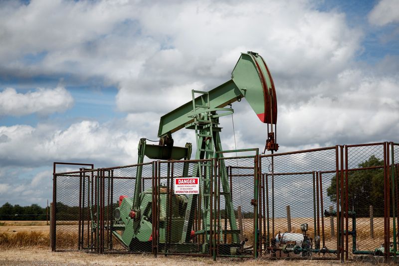 FILE PHOTO: A pumpjack operates at the Vermilion Energy site in Trigueres, France, June 14, 2024. REUTERS/Benoit Tessier/File Photo