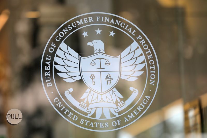 FILE PHOTO: Signage is seen at the Consumer Financial Protection Bureau (CFPB) headquarters in Washington, D.C., U.S., August 29, 2020. REUTERS/Andrew Kelly/File Photo