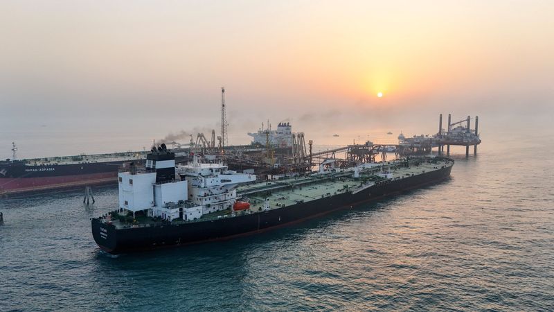 FILE PHOTO: A drone view shows oil tankers loading crude oil at the Basra Oil Terminal in Iraqi territorial waters, off the coast of Basra, Iraq, August 5, 2025. REUTERS/Mohammed Aty/File Photo