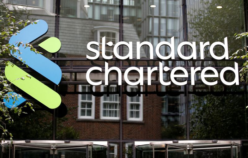 FILE PHOTO: The Standard Chartered bank logo is seen at their headquarters in London, Britain, July 26, 2022.  REUTERS/Peter Nicholls/File Photo