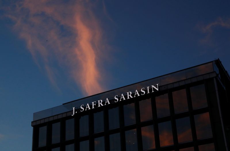 FILE PHOTO: A company logo is pictured on the J. Safra Sarasin bank in Geneva, Switzerland, October 17, 2017. REUTERS/Denis Balibouse/File Photo