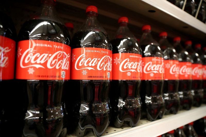 FILE PHOTO: Bottles of Coca-Cola are seen at a grocery store in Los Angeles, California U.S. November 21, 2017. REUTERS/Lucy Nicholson/File Photo