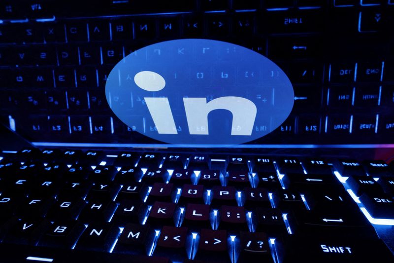 FILE PHOTO: A keyboard is placed in front of a displayed LinkedIn logo in this illustration taken February 21, 2023. REUTERS/Dado Ruvic/Illustration/File Photo