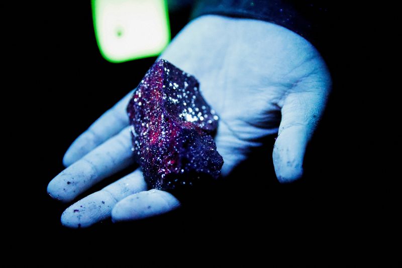 FILE PHOTO: Tungsten is illuminated with mineral light in a mine in Gangwon Province, South Korea, March 31, 2022. REUTERS/ Heo Ran/File Photo