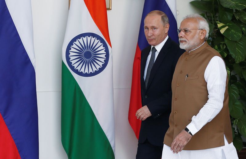 Russian President Vladimir Putin and India's Prime Minister Narendra Modi arrive ahead of their meeting at Hyderabad House in New Delhi, India, October 5, 2018. REUTERS/Adnan Abidi/ File Photo