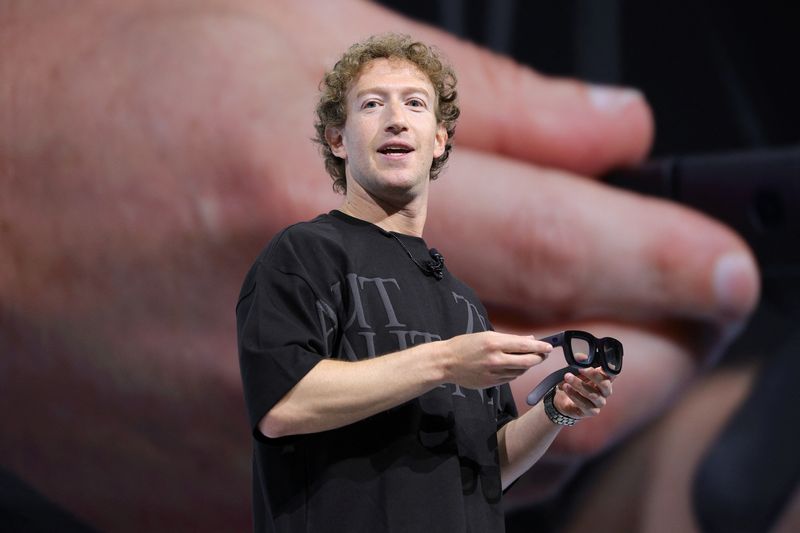 FILE PHOTO: Meta CEO Mark Zuckerberg presents Orion AR glasses at the Meta Connect annual event at the company's headquarters in Menlo Park, California, U.S., September 25, 2024. REUTERS/Manuel Orbegozo/File Photo