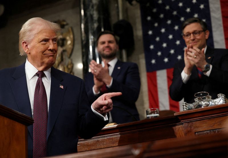 FILE PHOTO: WASHINGTON, DC - MARCH 04: U.S. Vice President JD Vance and Speaker of the House Mike Johnson (R-LA) applaud as U.S. President Donald Trump addresses a joint session of Congress at the U.S. Capitol on March 04, 2025 in Washington, DC.     Win McNamee/Pool via REUTERS/File Photo
