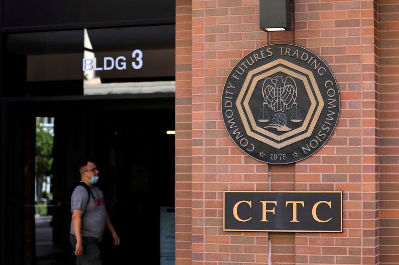 FILE PHOTO: Signage is seen outside of the US Commodity Futures Trading Commission (CFTC) in Washington, D.C., U.S., August 30, 2020. REUTERS/Andrew Kelly/File Photo