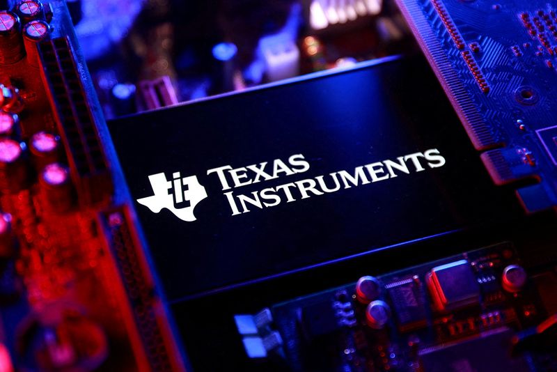 FILE PHOTO: A Texas Instruments logo and a computer motherboard appear in this illustration taken August 25, 2025. REUTERS/Dado Ruvic/Illustration/File Photo