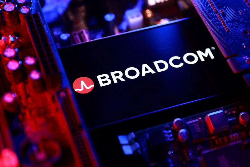 A Broadcom logo and a computer motherboard appear in this illustration taken August 25, 2025. REUTERS/Dado Ruvic/Illustration