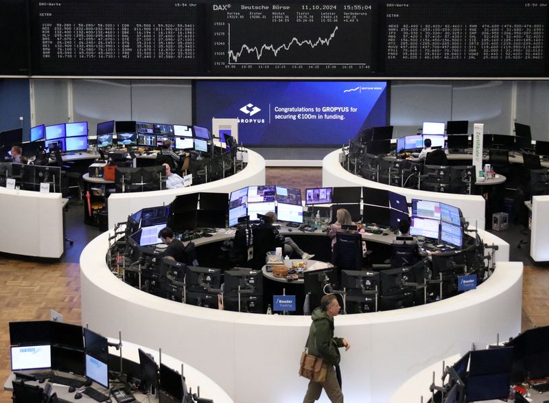 FILE PHOTO: The German share price index DAX graph is pictured at the stock exchange in Frankfurt, Germany, October 11, 2024.   REUTERS/Staff/File Photo