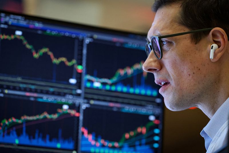 A Futures-options trader works on the floor at the American Stock Exchange (AMEX) at the New York Stock Exchange (NYSE) in New York City, U.S., October 17, 2025.  REUTERS/Brendan McDermid