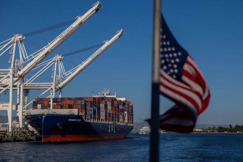 A cargo ship full of shipping containers is seen at the port of Oakland, California, U.S., August 4, 2025. REUTERS/Carlos Barria