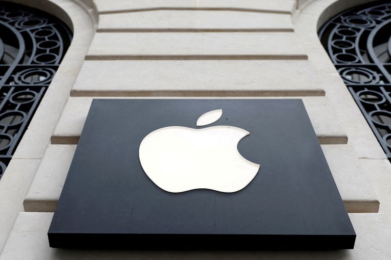 FILE PHOTO: View of an Apple logo at an Apple store in Paris, France, April 23, 2025. REUTERS/Abdul Saboor/File Photo