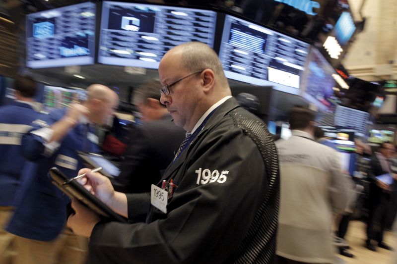 Traders work on the floor of the New York Stock Exchange (NYSE) February 24, 2016. REUTERS/Brendan McDermid