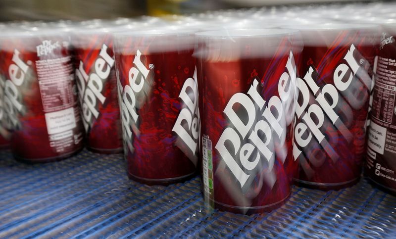 Aluminium Dr Pepper cans leave the production line at Ball Corporation, Wakefield, Britain, October 18, 2019. REUTERS/Andrew Yates