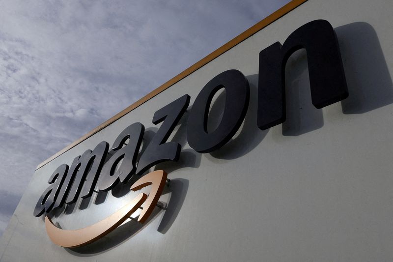 FILE PHOTO: The logo of Amazon is seen at the company logistics center in Lauwin-Planque, northern France, November 15, 2022.  REUTERS/Pascal Rossignol/File Photo