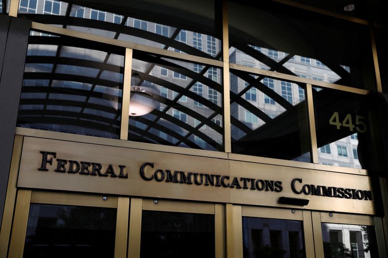 FILE PHOTO: Signage is seen at the headquarters of the Federal Communications Commission in Washington, D.C., U.S., August 29, 2020. REUTERS/Andrew Kelly/File Photo/File Photo