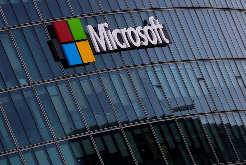 FILE PHOTO: A view shows a Microsoft logo at Microsoft offices in Issy-les-Moulineaux near Paris, France, March 21, 2025. REUTERS/Gonzalo Fuentes/File Photo
