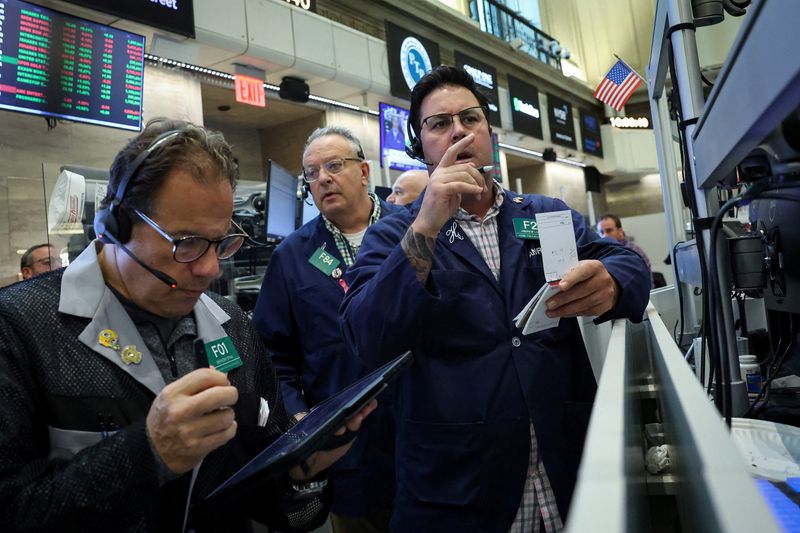 Futures-options traders work on the floor at the New York Stock Exchange's NYSE American in New York City, U.S., October 22, 2025. REUTERS/Brendan McDermid