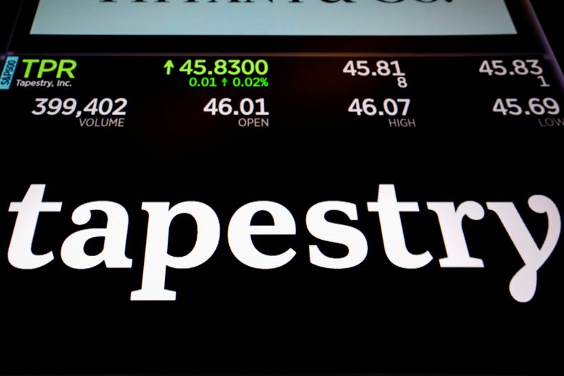 Tapestry Inc. logo and trading information are displayed on a screen on the floor of the New York Stock Exchange (NYSE) in New York, U.S., June 13, 2018. REUTERS/Brendan McDermid/File Photo