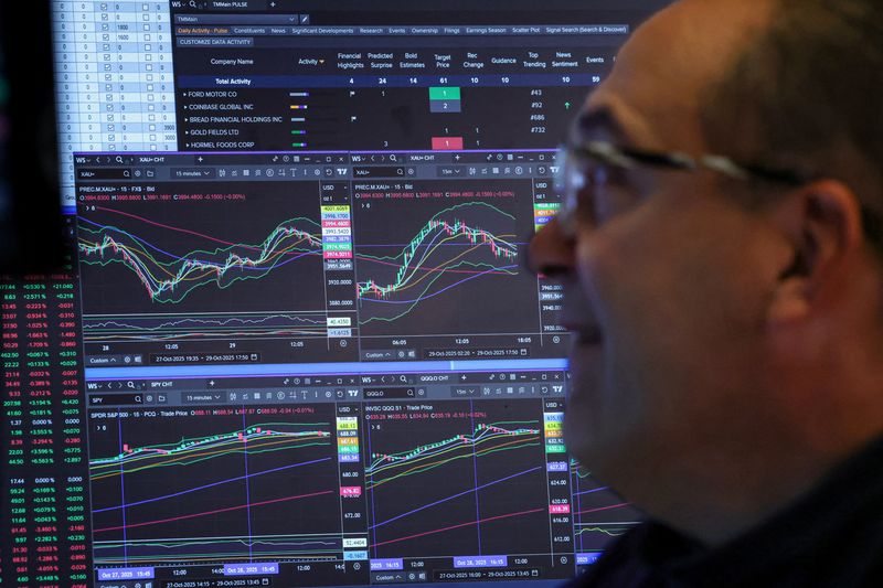A trader works on the floor at the New York Stock Exchange (NYSE) in New York City, U.S., October 29, 2025.  REUTERS/Brendan McDermid