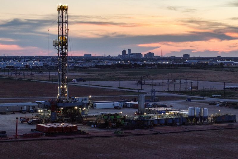 A drone view of a drilling rig south of Midland, Texas, U.S. June 11, 2025. REUTERS/Eli Hartman