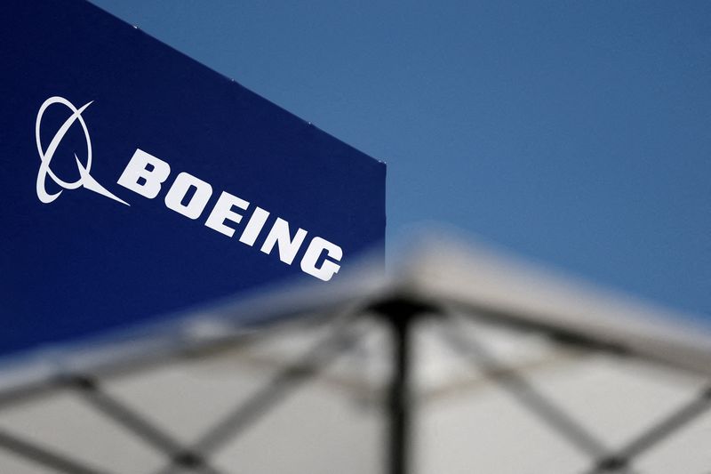 FILE PHOTO: The logo of Boeing is seen at the 55th International Paris Airshow at Le Bourget Airport near Paris, France, June 20, 2025. REUTERS/Benoit Tessier/Pool/File Photo