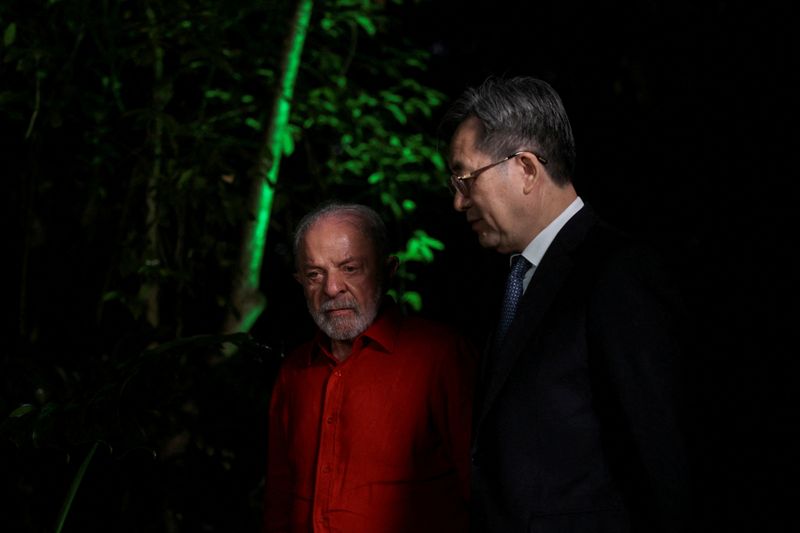 FILE PHOTO: Brazil's President Luiz Inacio Lula da Silva stands with China's Vice Premier Ding Xuexiang, ahead of the United Nations Climate Change Conference (COP 30), in Belem, Brazil, November 5, 2025. REUTERS/Adriano Machado/File Photo
