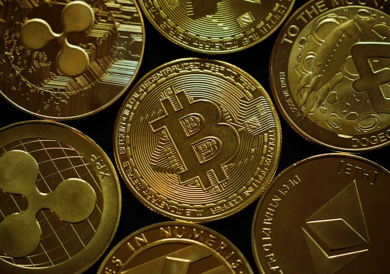 A representation of the virtual cryptocurrency Bitcoin is seen in this picture illustration taken June 14, 2021.   REUTERS/Edgar Su/Illustration