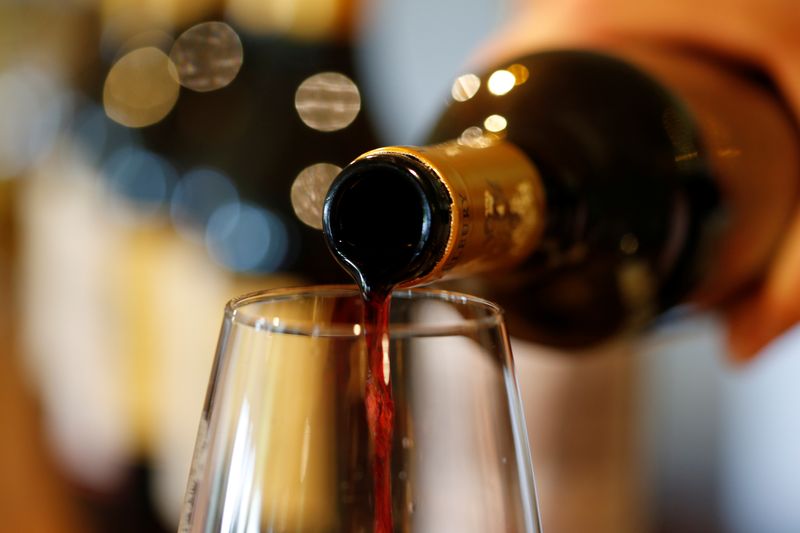 French red wine is poured into a glass at the Chateau du Pavillon in Sainte-Croix-Du-Mont, France, July 29, 2019. Picture taken July 29, 2019. REUTERS/Regis Duvignau