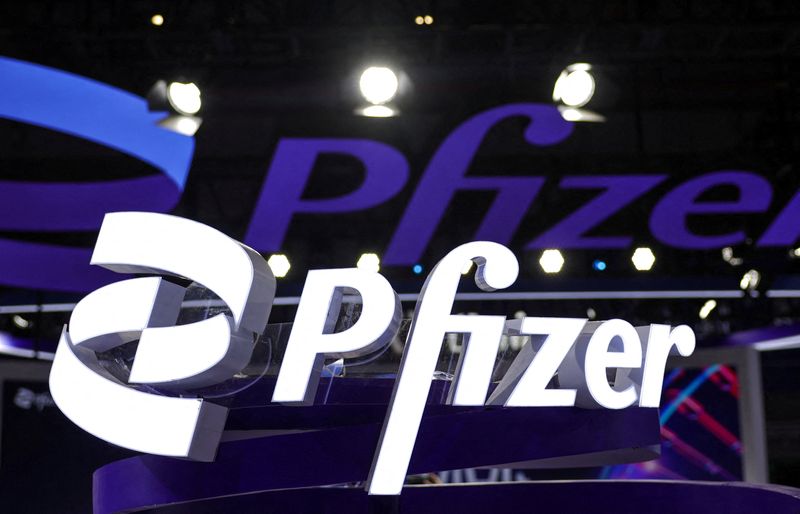 FILE PHOTO: Logos of Pfizer at the company’s booth at the 8th China International Import Expo (CIIE) in Shanghai, China, November 6, 2025.REUTERS/Maxim Shemetov/File Photo
