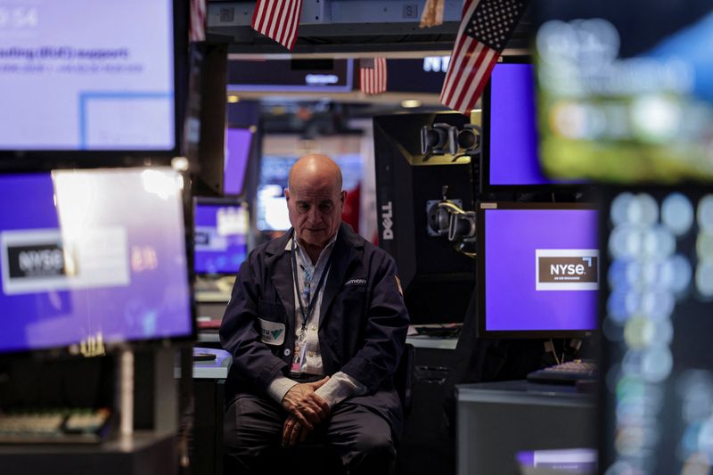 A trader works on the floor at the New York Stock Exchange (NYSE) in New York City, U.S., November 14, 2025. REUTERS/Jeenah Moon
